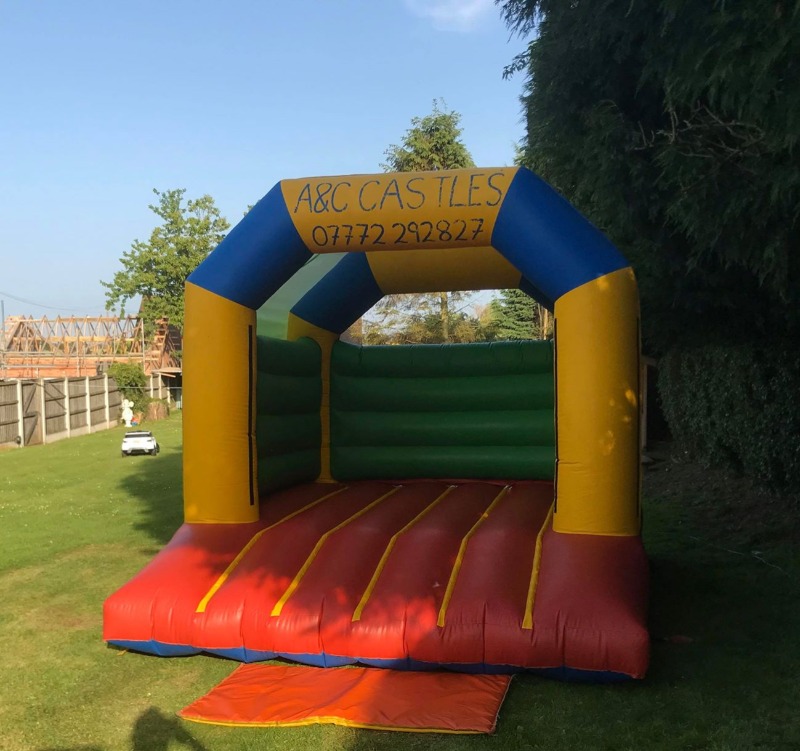 Multi Coloured 10x12 Roofed Bouncy Castle With Built In Rain Cover AC