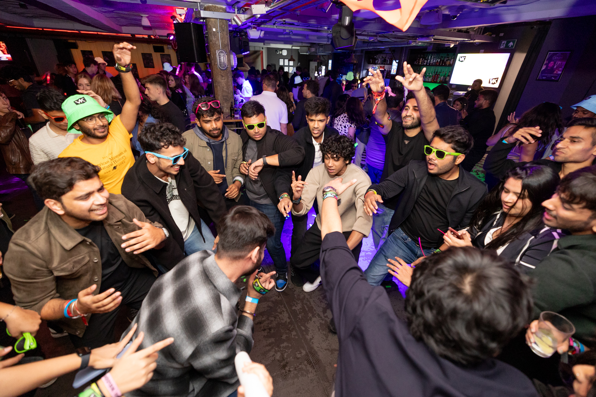 Students dancing in a bar