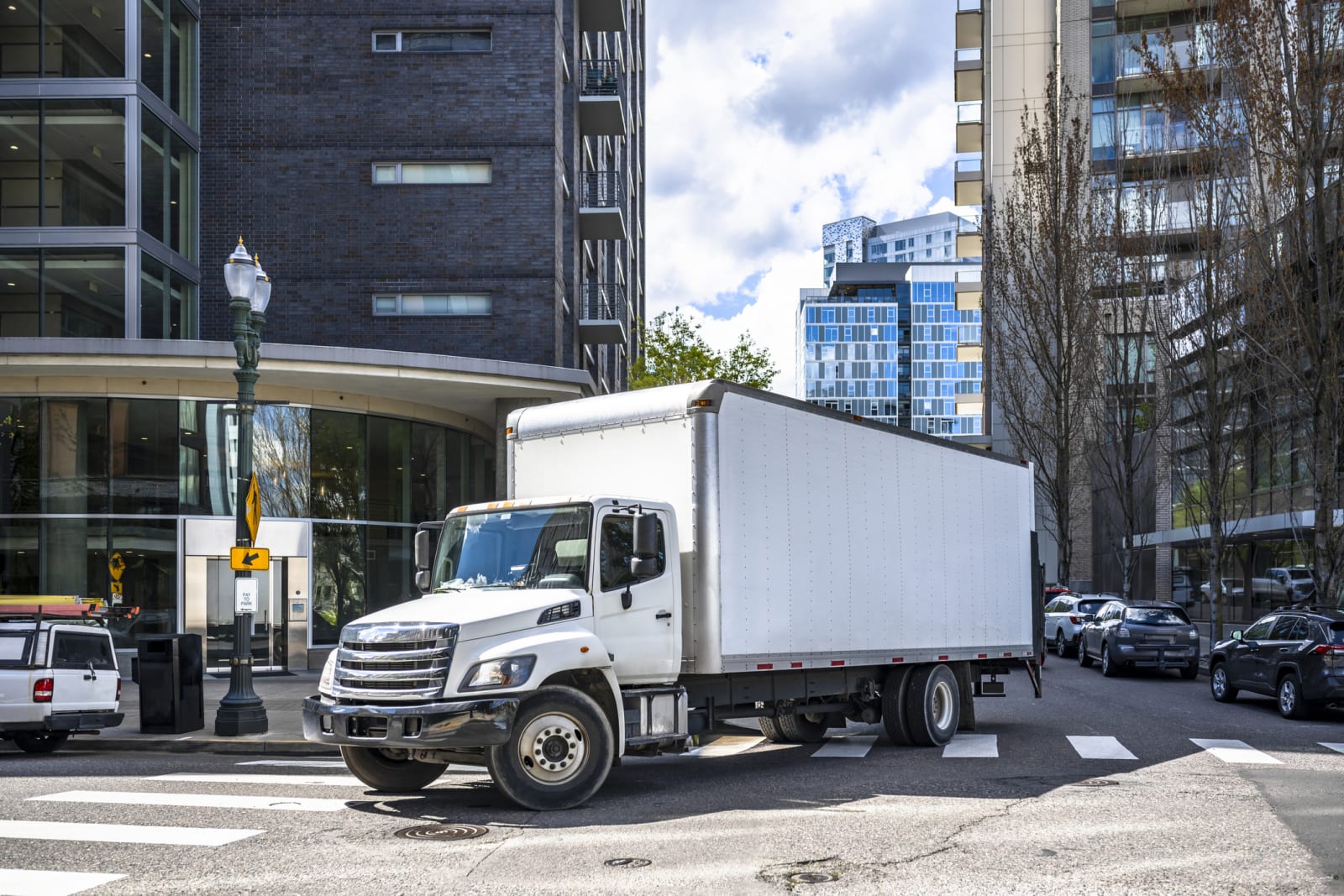 Commercial vehicles on a Miami Florida highway covered by commercial auto insurance from Tammy Insurance Agency