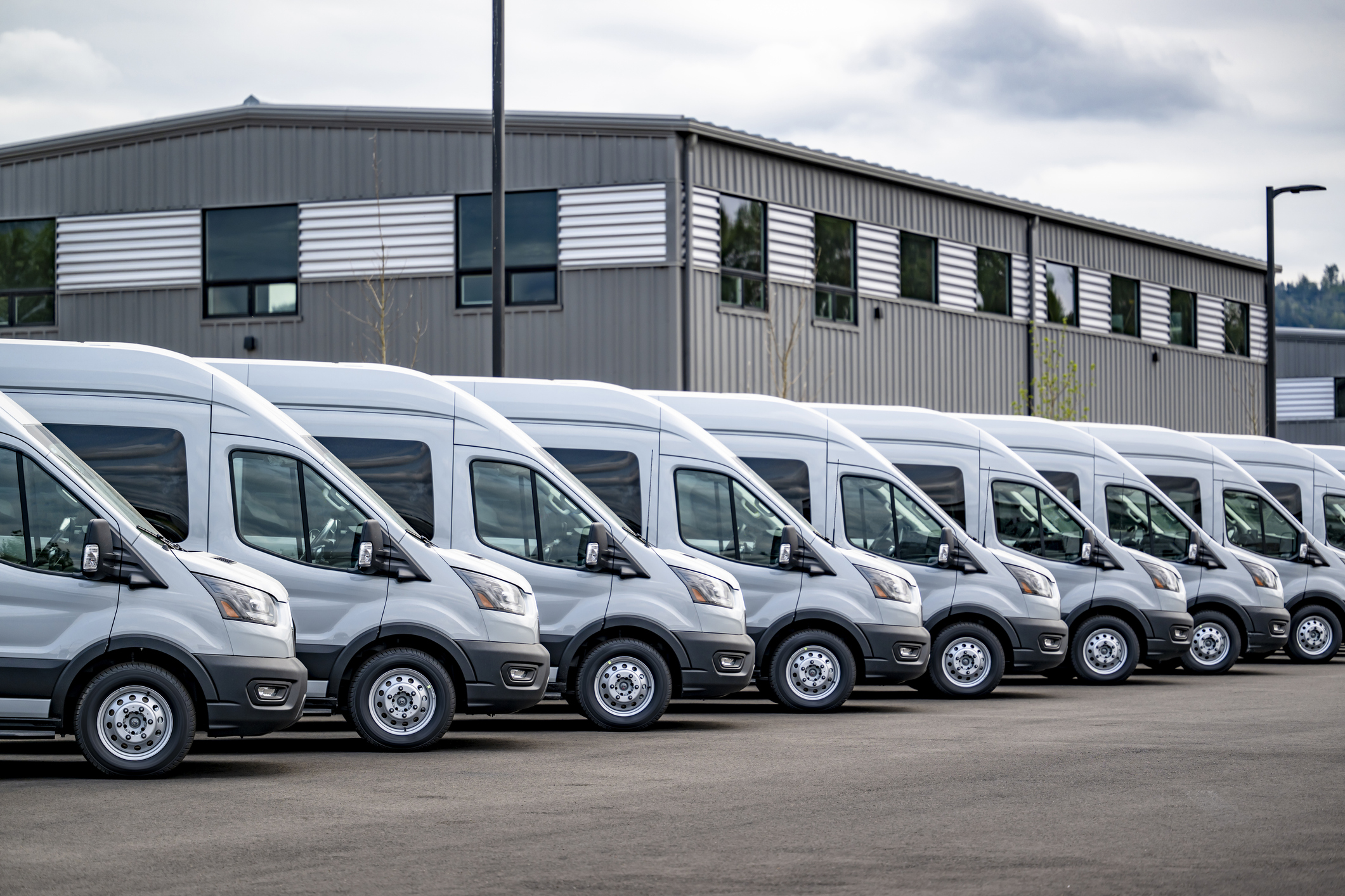 Fleet of commercial work trucks and vans