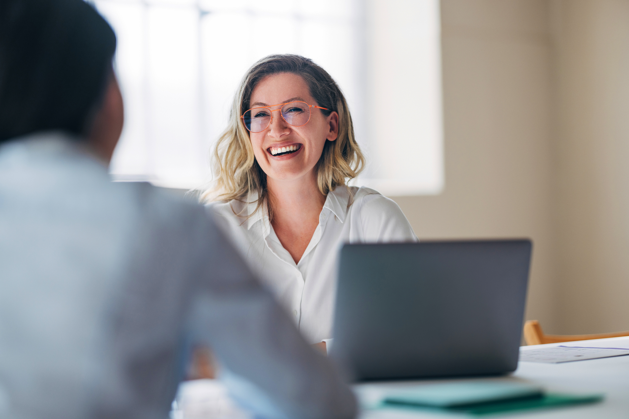 Female independent insurance agent comparing quotes from multiple carriers for a Florida client