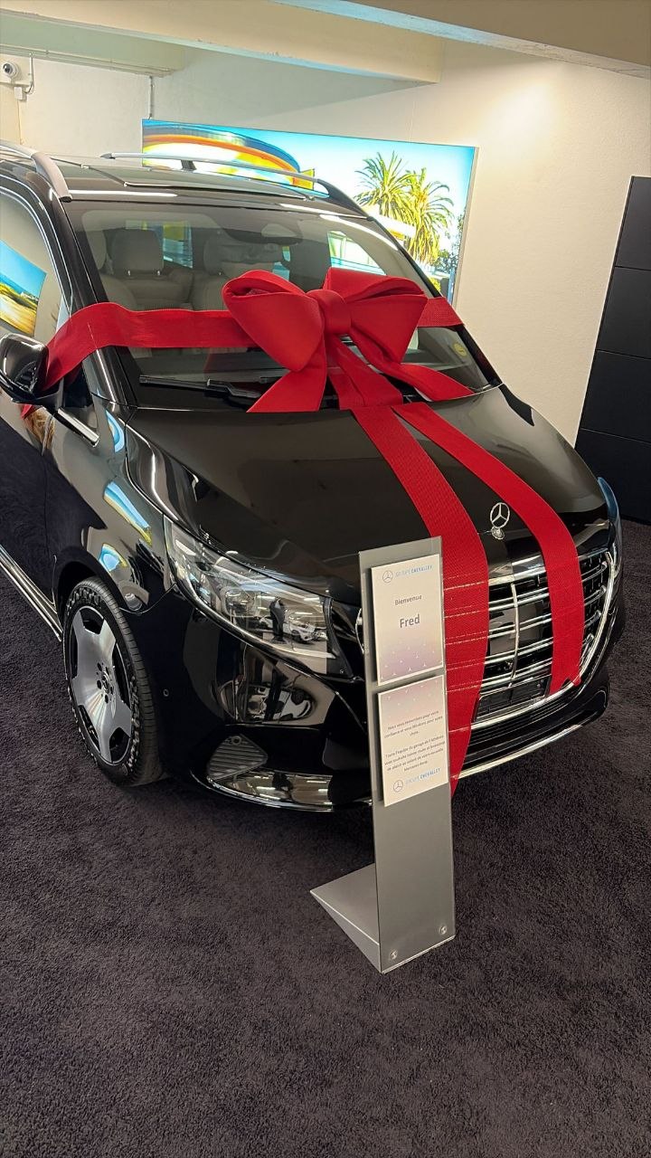 Good Morning Transport chauffeur opening a luxury vehicle in Switzerland