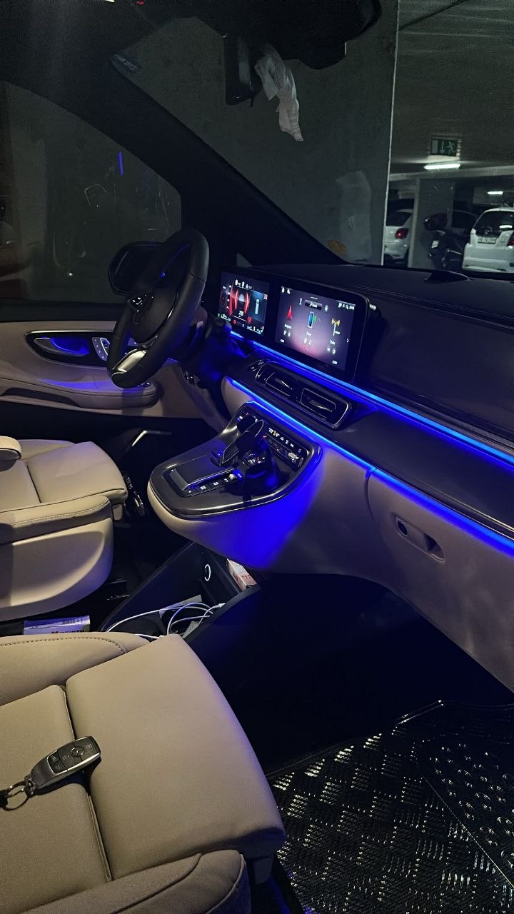 Luxury chauffeur sedan at a Swiss hotel entrance