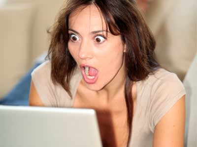 Shocked-Woman-At-Laptop