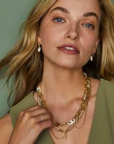 Bailey Gold Pave Huggie Earrings in White CZ