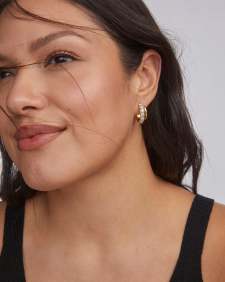 Livy Gold Huggie Earrings in White Crystal