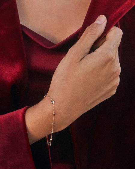 Michelle 14k Yellow Gold Delicate Chain Bracelet in Emerald