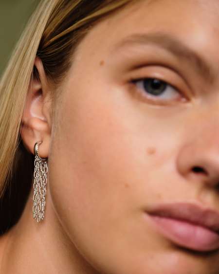 Eve Huggie Earrings in Silver