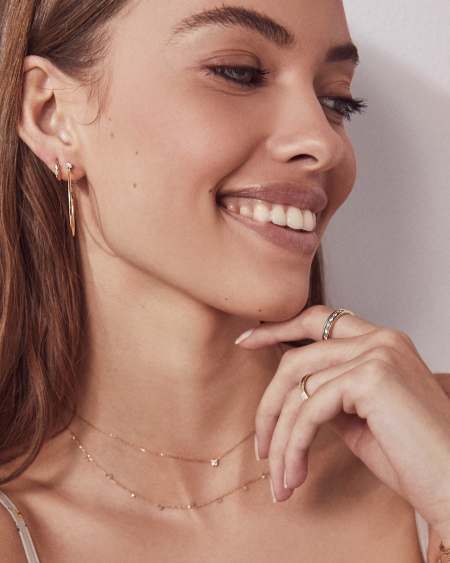 Audrey 14k Huggie Earrings in White Diamond