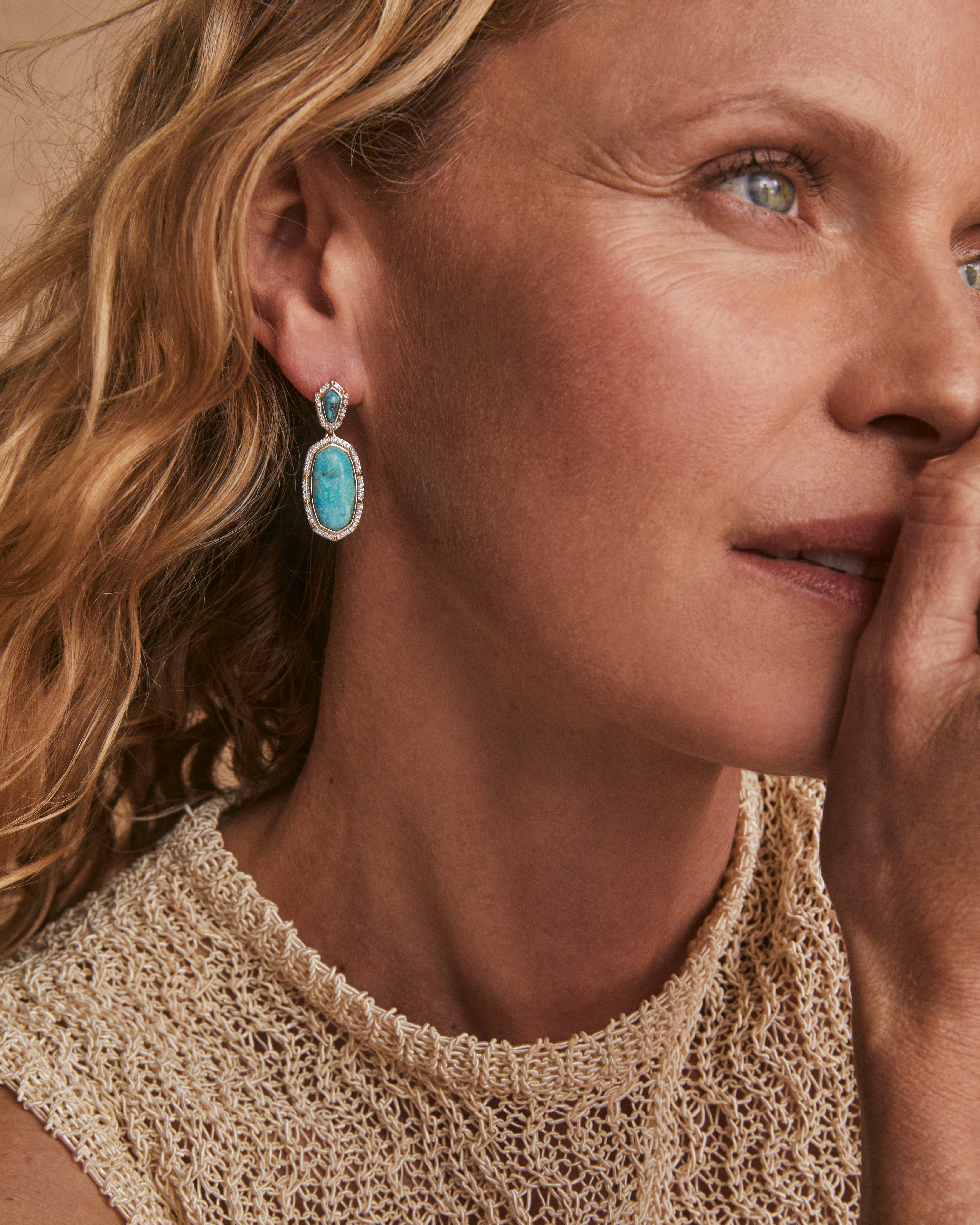 women in turquoise earrings