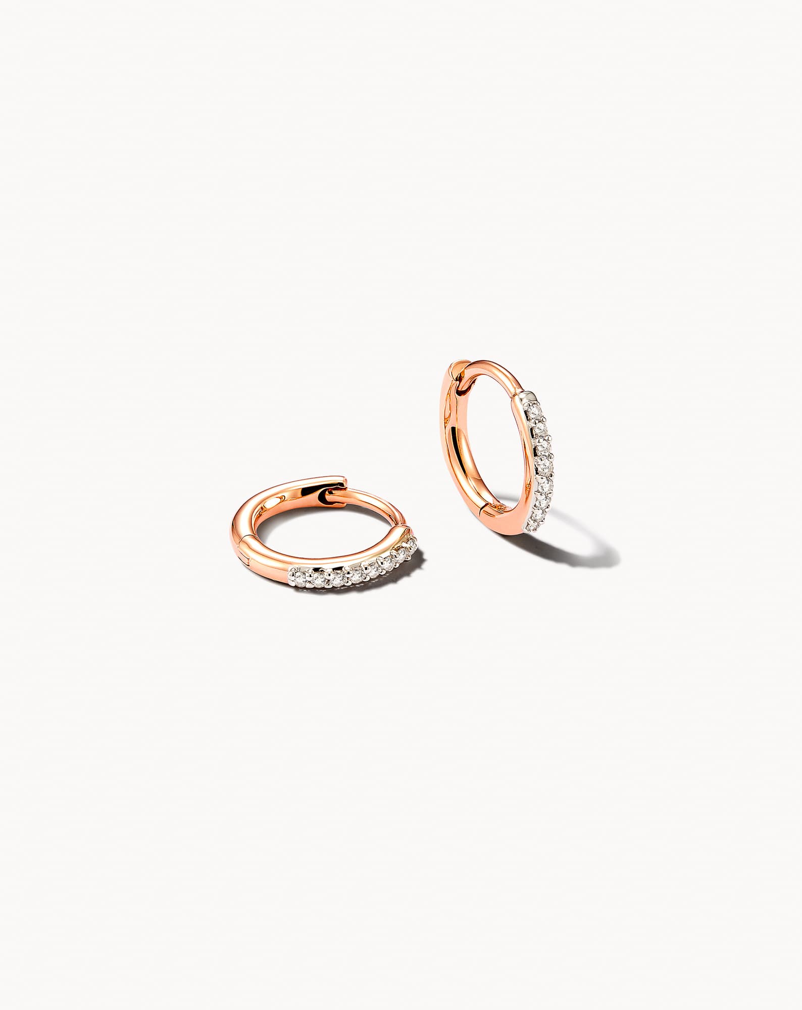 Mila 14k Rose Gold Huggie Earrings in White Diamond