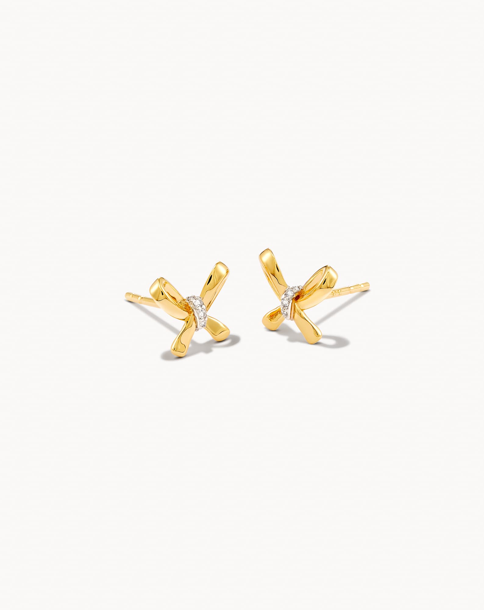 Bow Stud Earrings in White Diamond
