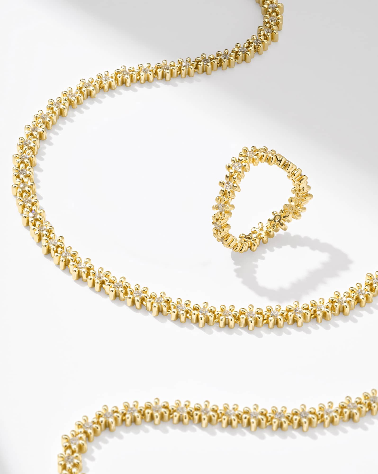 Nydia Gold Strand Necklace in White CZ