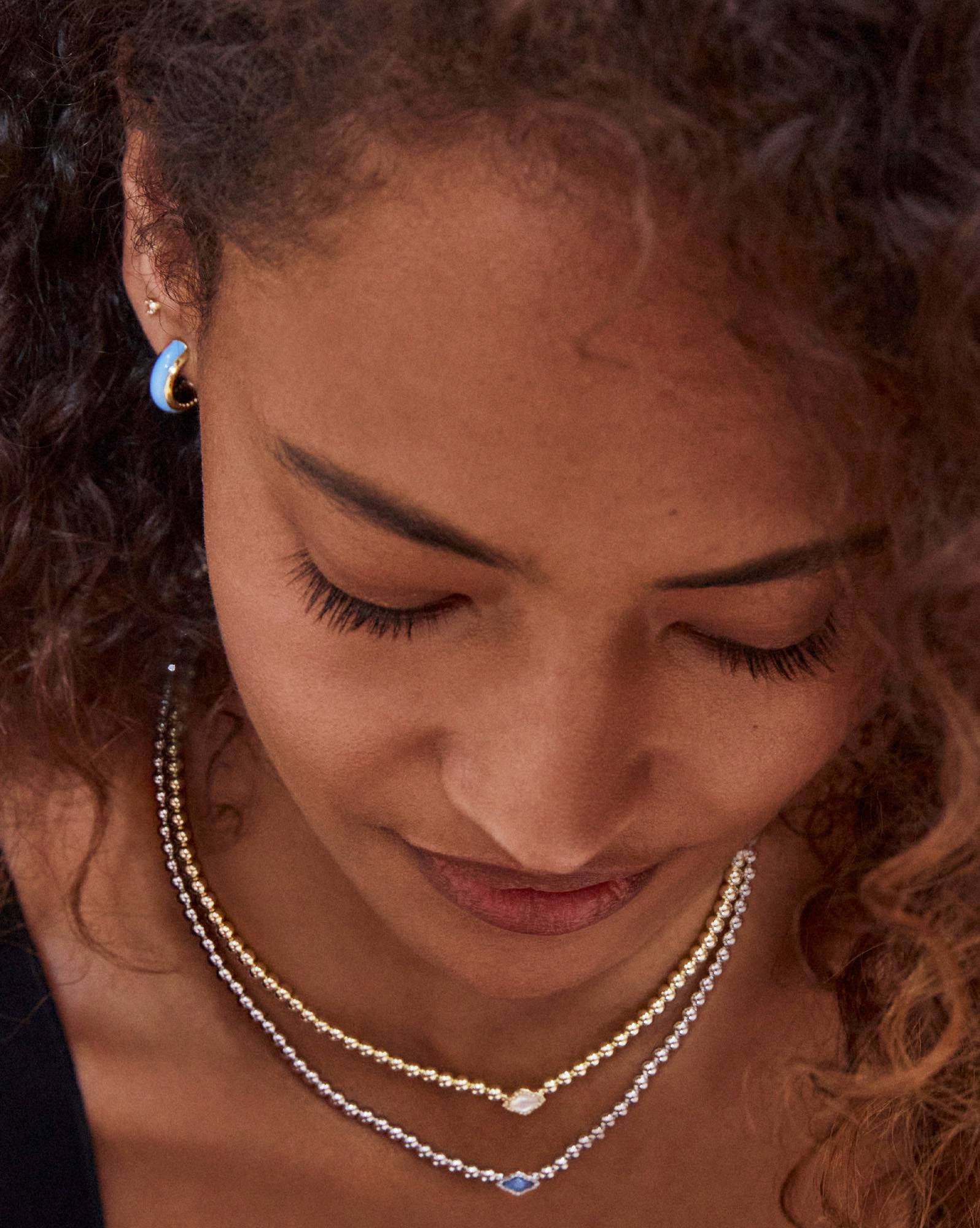 Ainsley Gold Huggie Earrings in Light Blue Enamel