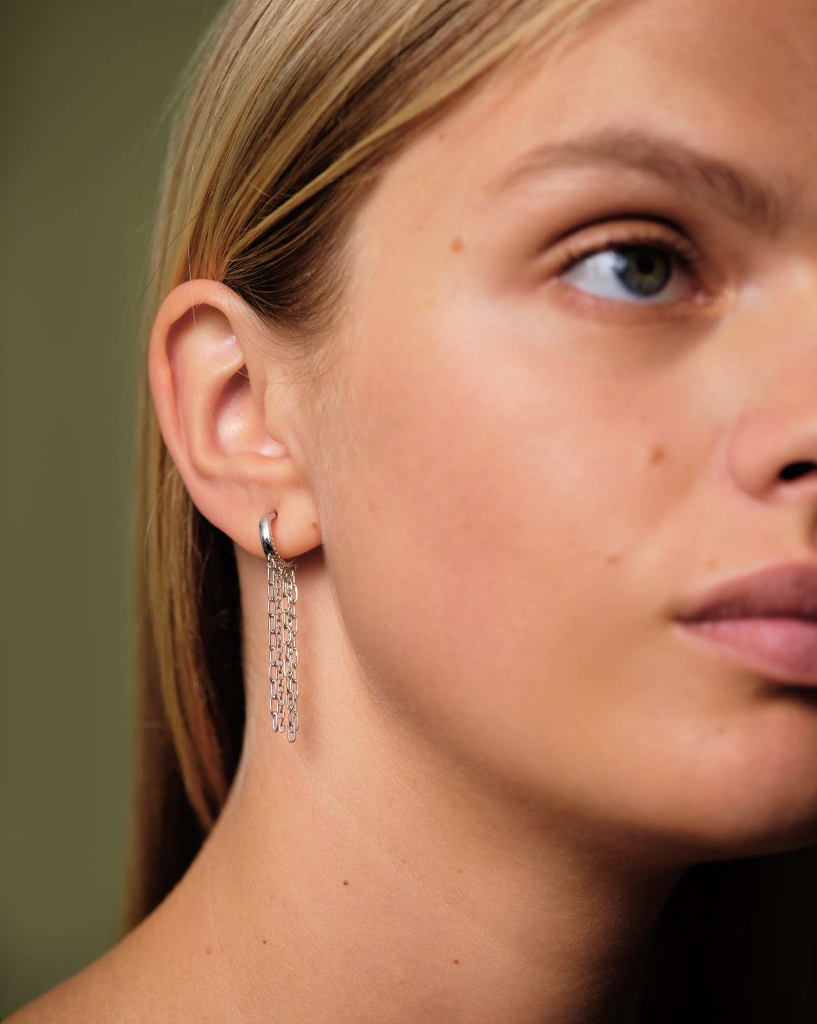 Eve Huggie Earrings in Silver