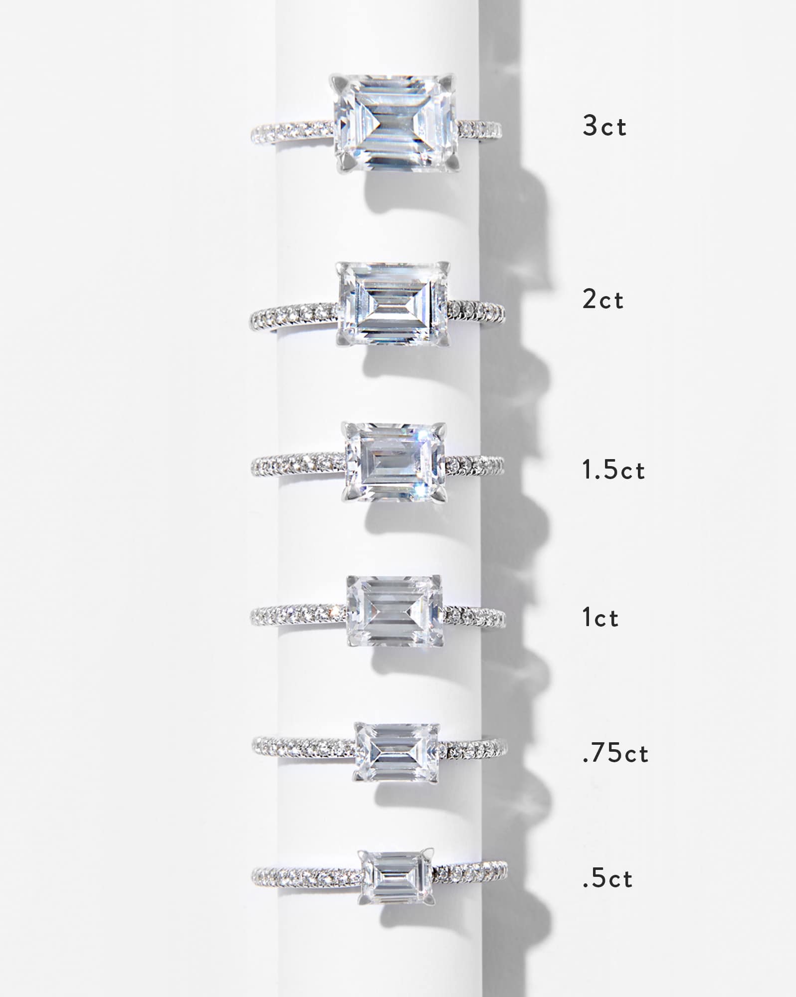 Emerald Solitaire Engagement Ring with Pave Diamonds