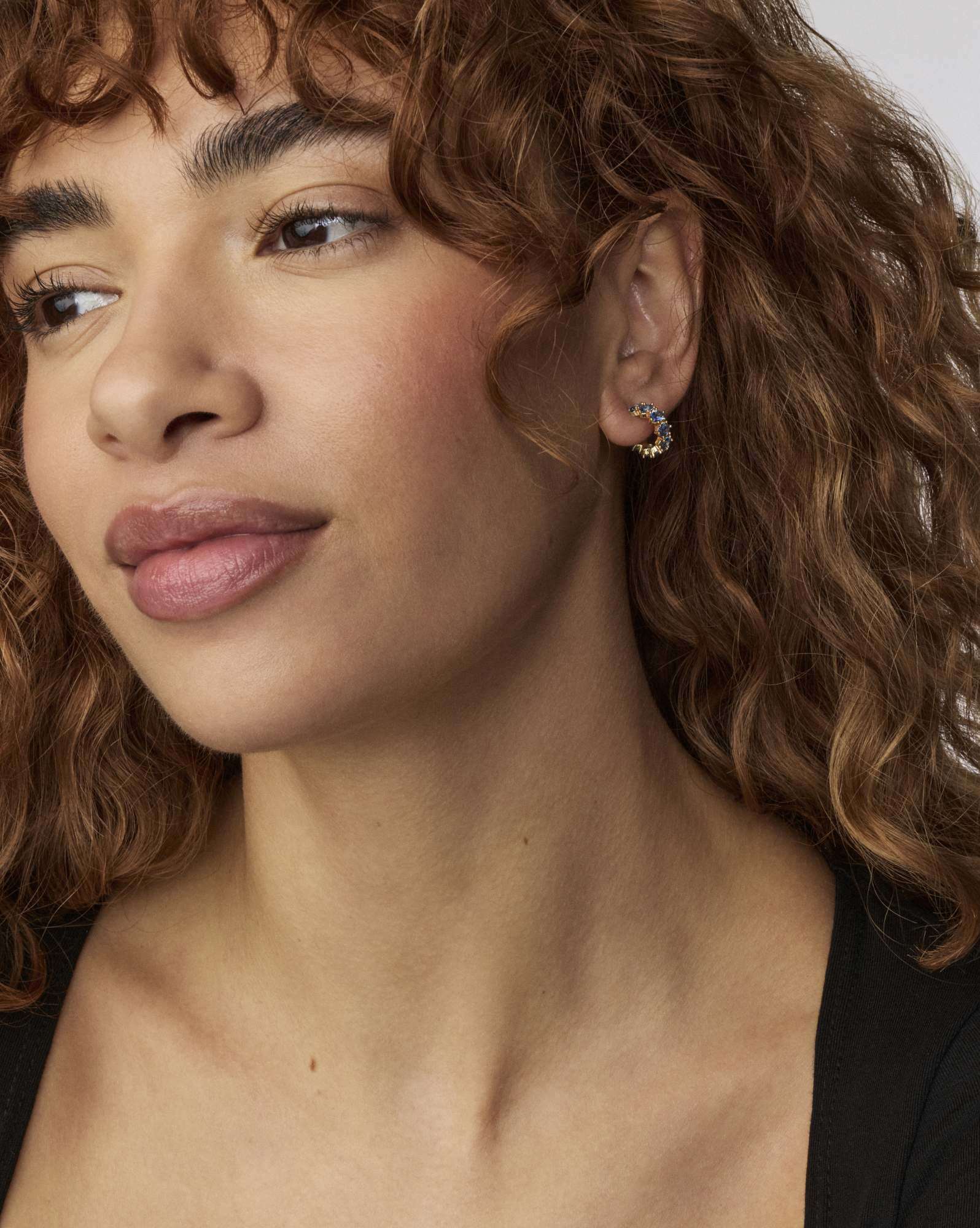 Cailin Gold Huggie Earrings in Blue Violet Crystal