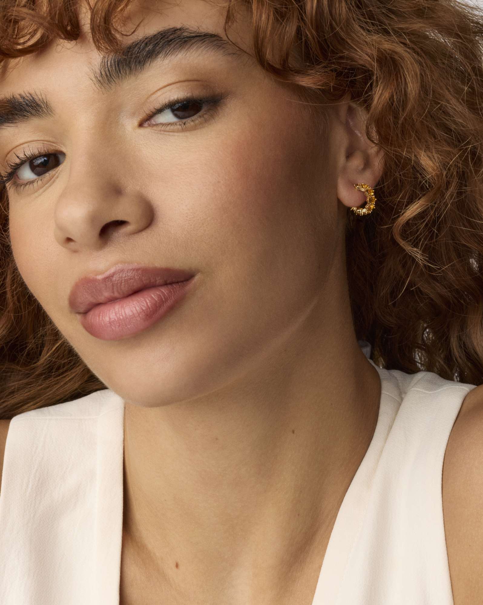 Cailin Gold Huggie Earrings in Golden Yellow Crystal