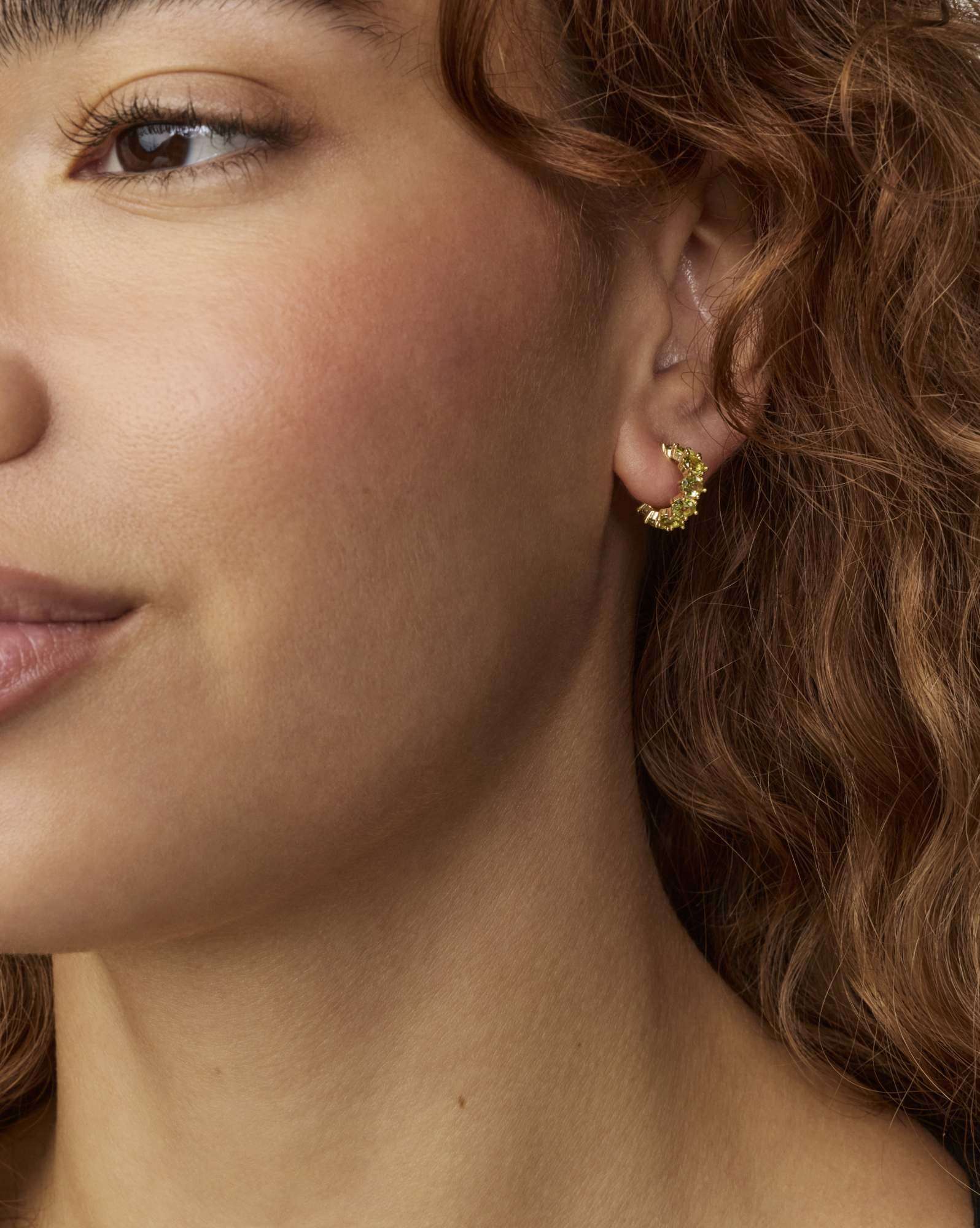 Cailin Gold Huggie Earrings in Light Green Crystal