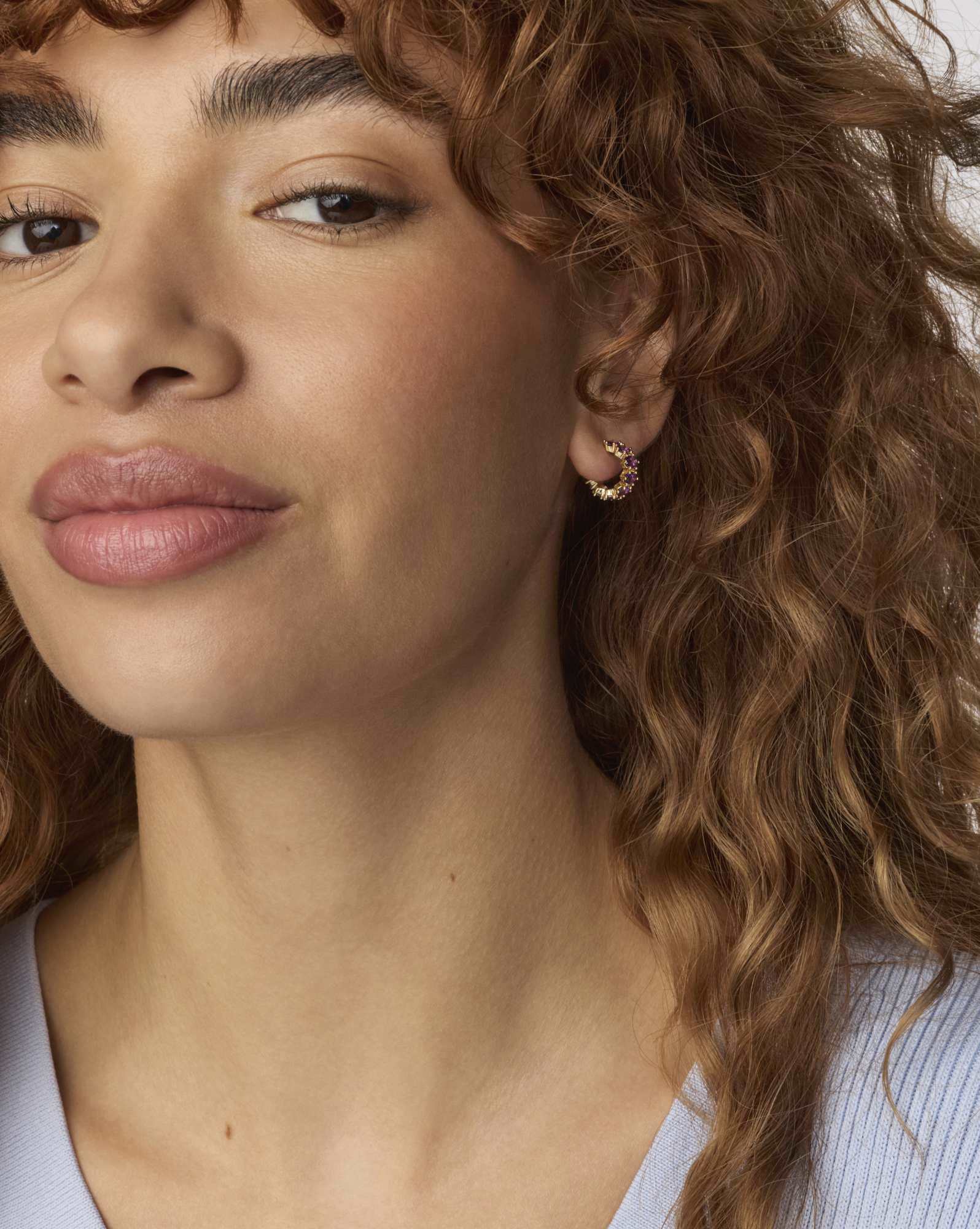 Cailin Gold Huggie Earrings in Purple Crystal