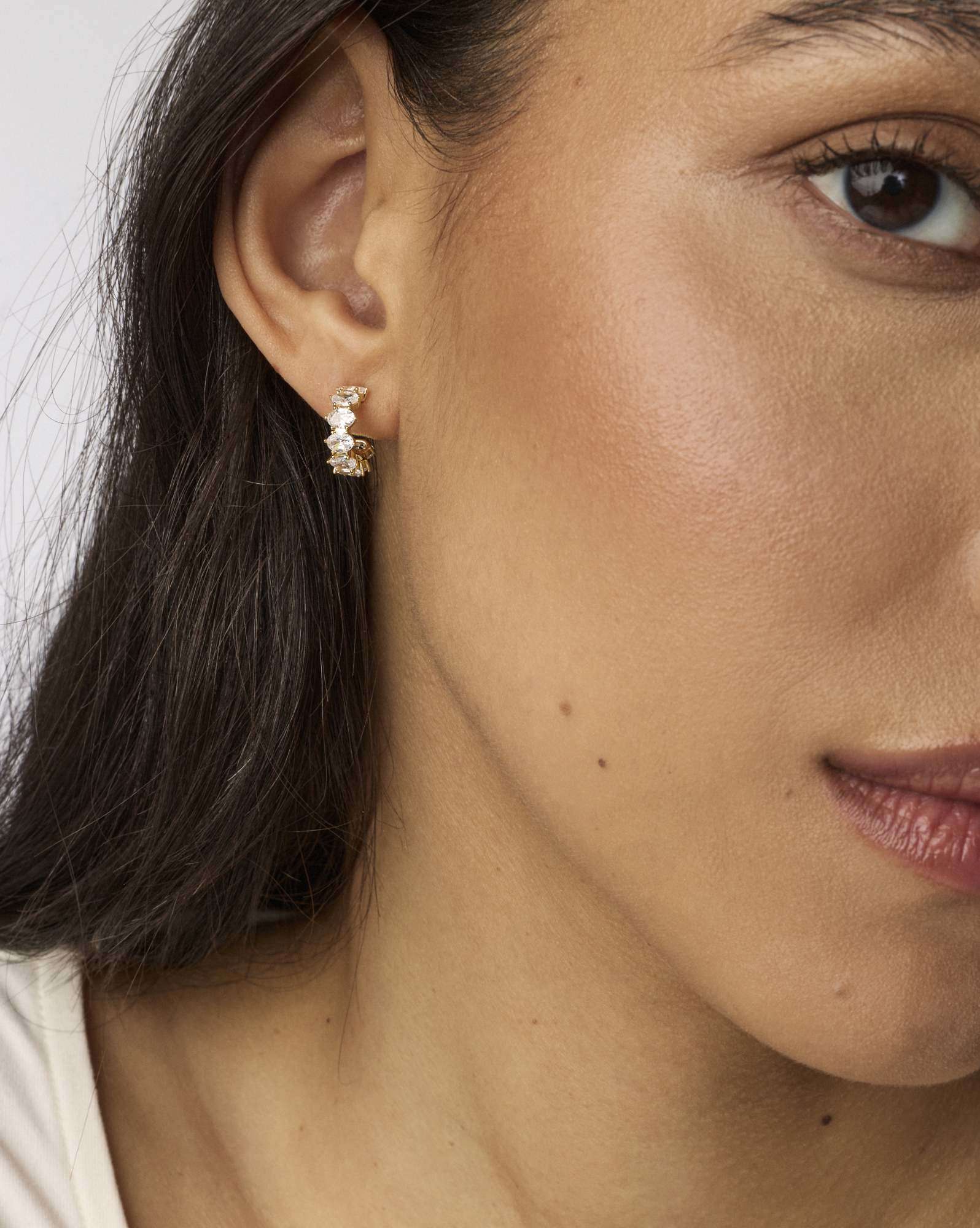 Cailin Gold Crystal Huggie Earrings in White CZ
