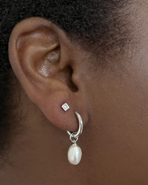 Willa Silver Pearl Huggie Earrings in White Pearl