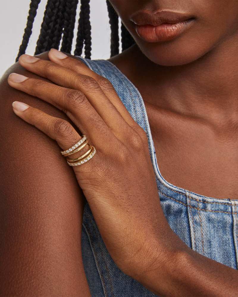 Livy Gold Huggie Earrings in White Crystal