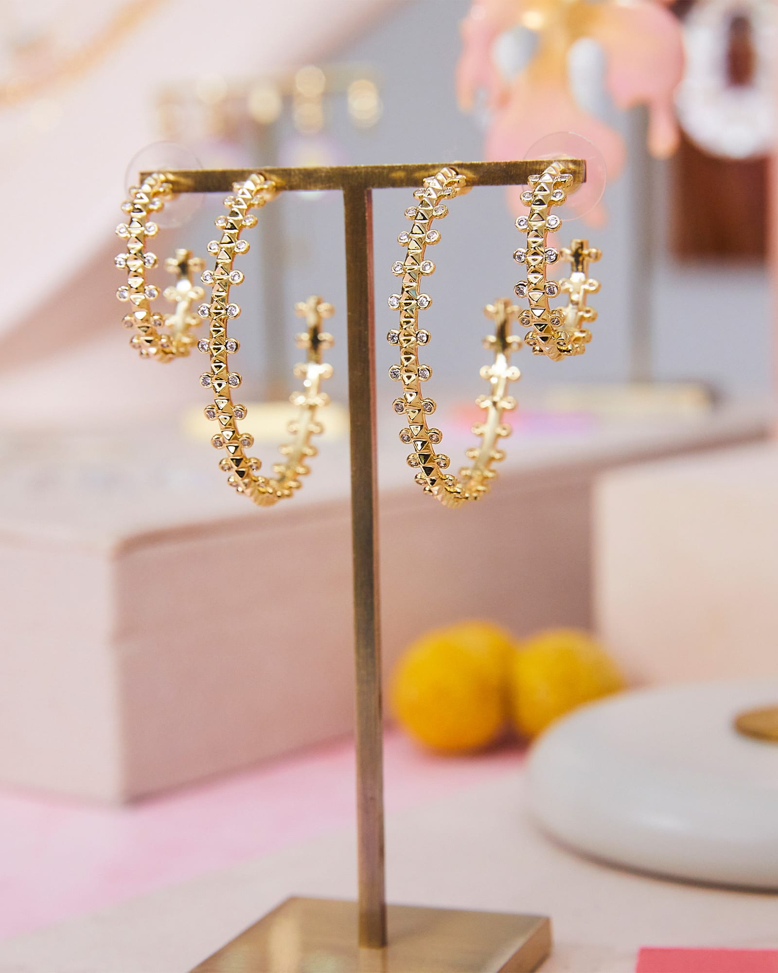 Jada Gold Hoop Earrings in White Crystal