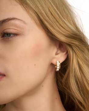 Livy Gold Huggie Earrings in White Crystal