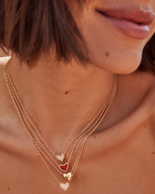 Framed Ari Heart Gold Short Pendant Necklace in White Opalescent Resin image number 1.0