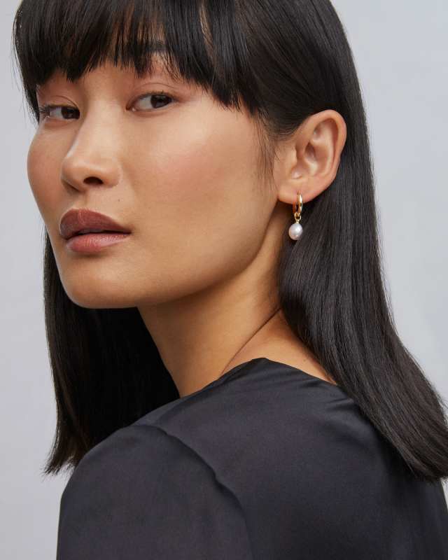 Willa Gold Pearl Huggie Earrings in White Pearl