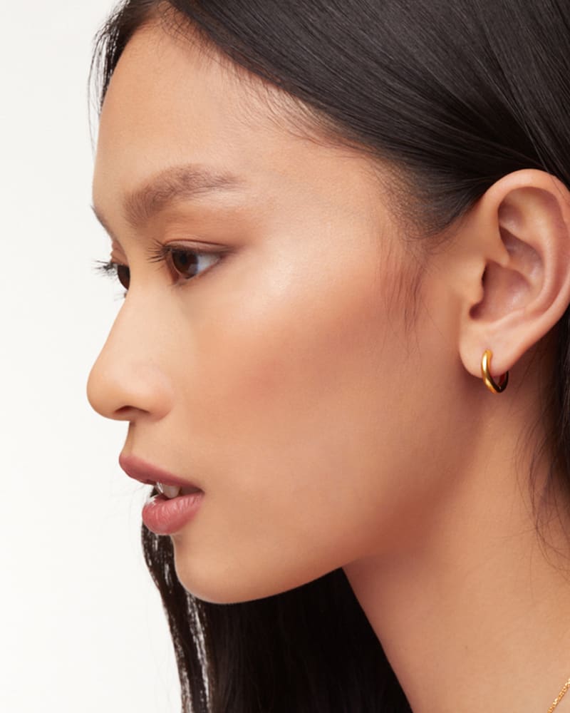 Angie Carved Heart 18k Gold Vermeil Huggie Earrings in White Sterling Opal image number 2