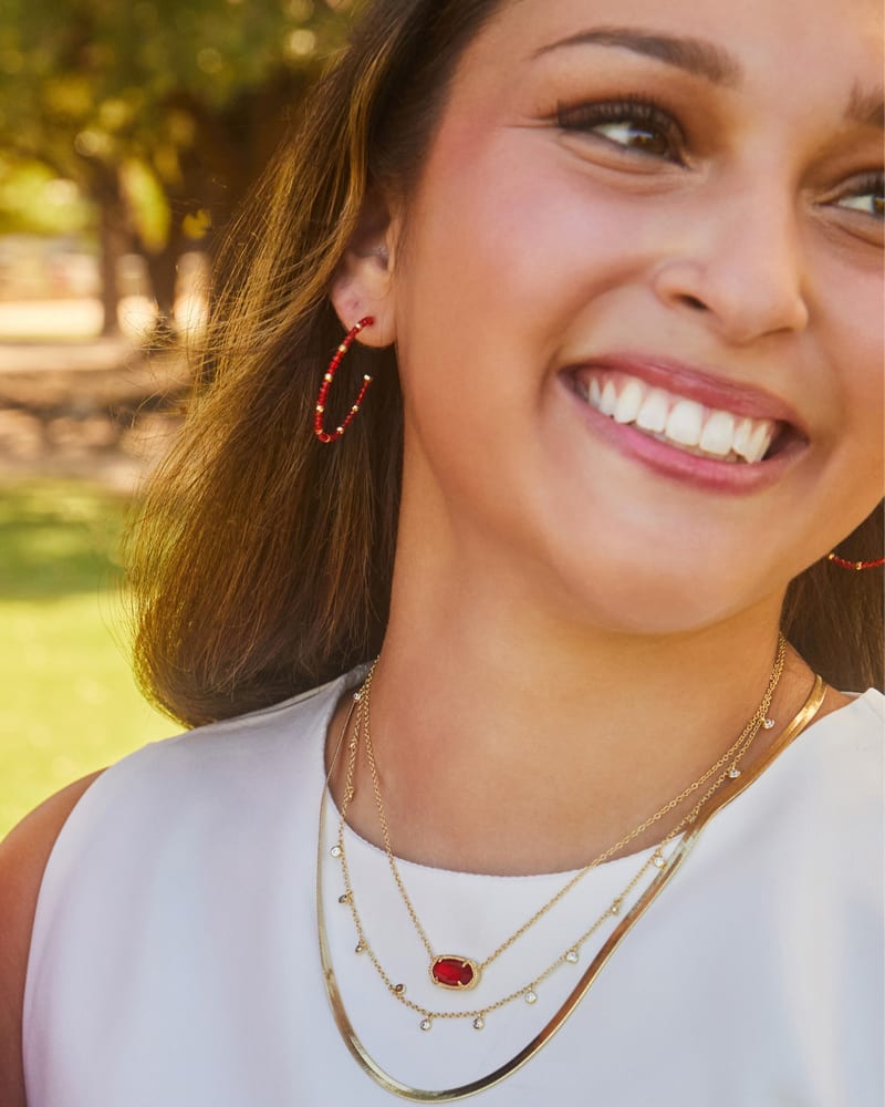 Britt Gold Thin Beaded Hoop Earrings in Red Glass image number 1
