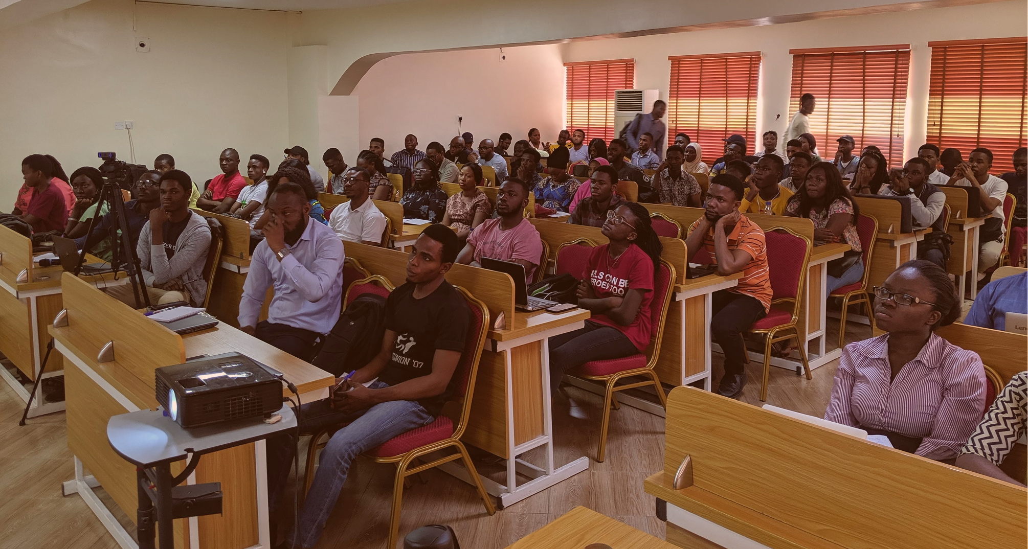 A TRI AI Saturdays classroom session, with learners working through curriculum together