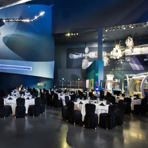 Tables set up for an event in the Atlantis meeting room