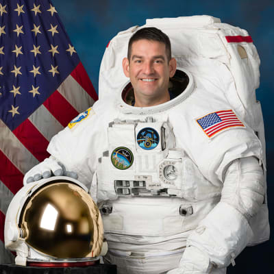 Official portrait of NASA astronaut Jack Hathaway wearing a spacesuit, also called an Extravehicular Mobility Unit (EMU), at NASA's Johnson Space Center in Houston, Texas.