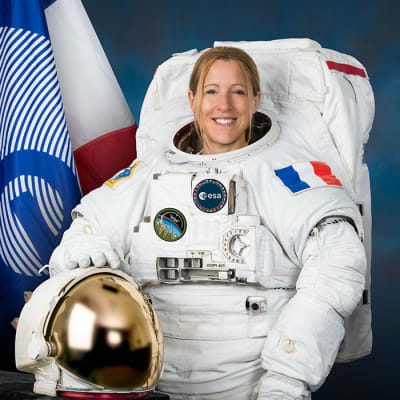 Official portrait of ESA (European Space Agency) astronaut Sophie Adenot wearing a spacesuit, also called an Extravehicular Mobility Unit (EMU), at NASA's Johnson Space Center in Houston, Texas.