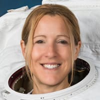 Official portrait of ESA (European Space Agency) astronaut Sophie Adenot wearing a spacesuit, also called an Extravehicular Mobility Unit (EMU), at NASA's Johnson Space Center in Houston, Texas.