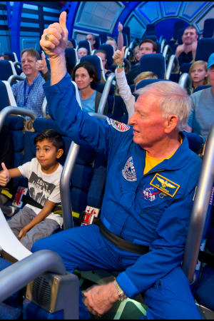 Group participating in the Fly With An Astronaut attraction.