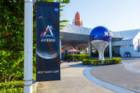 Artemis banner in NASA Central with the NASA insignia in the background