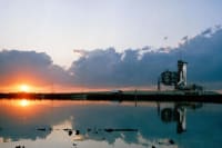 Rocket launch pad with sunset in the background