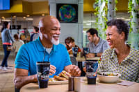 Couple eating at The Orbit Cafe