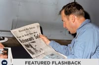 Astronaut reading about the Apollo 13 mission in the newspaper