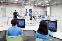 Students working on computers at the ATX center
