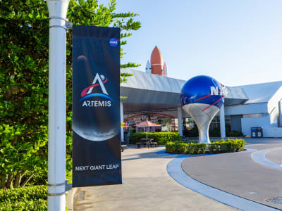 Artemis banner in NASA Central with the NASA insignia in the background