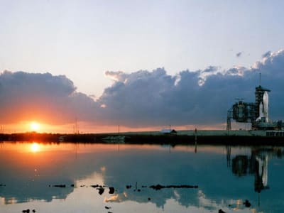 Rocket launch pad with sunset in the background