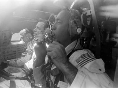Astronauts inside of a rocket during launch
