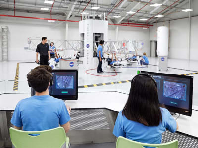 Students working on computers at the ATX center