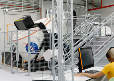 Student using a computer at the Astronaut Training Experience