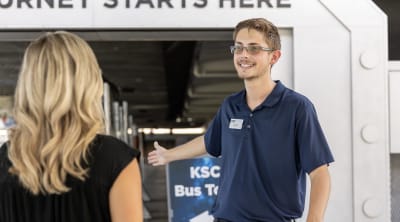 Guest services employee assisting a guest